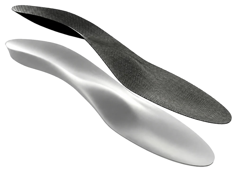 A custom orthotic by Evolve Orthotics Lab, with its top cover lifted above the shell